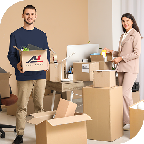 Two coworkers packing boxes in modern office