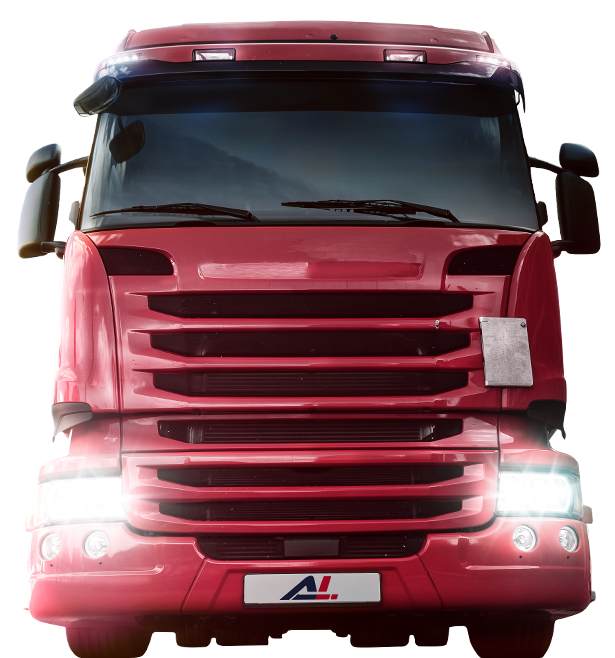 Front view of red semi-truck with headlights on